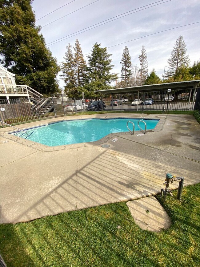 Building Photo - Upstairs 2 Bed / 2 Bath Condo in Gated Community – Available Now