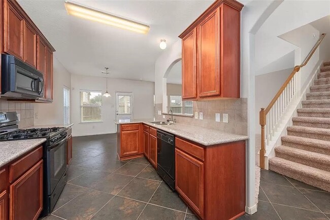 Building Photo - 10039 Noisy Waters Dr