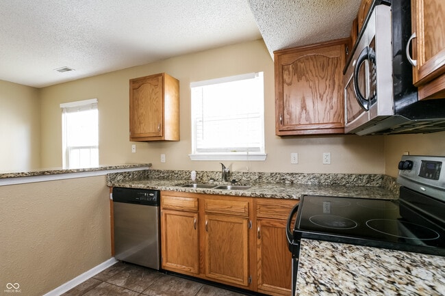 Building Photo - 10313 Cadogan Dr