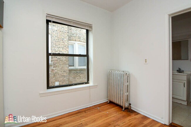 Building Photo - 933 W Sunnyside Ave