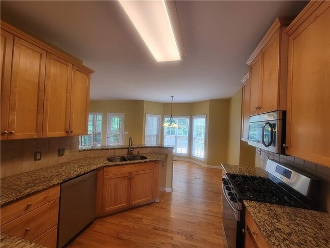 Building Photo - 5555 Holly Springs Dr