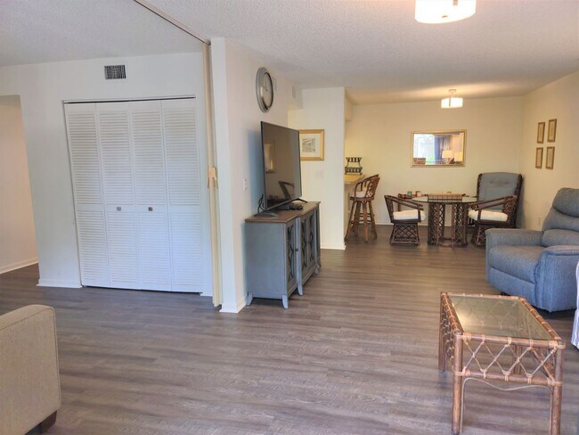 Building Photo - Bird Bay Village Annual Rental – Furnished 1st Floor Unit with Covered Parking