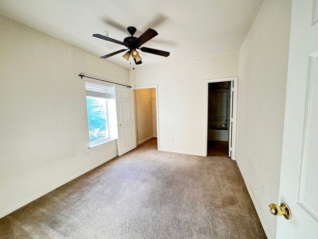 Building Photo - Home Near UNR: Spacious 4BR/4BA with Gated Access and Balcony!
