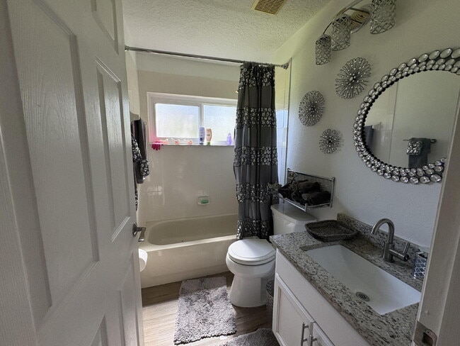 Building Photo - Spacious 4-Bedroom Oasis with 3 Full Baths in the Beautiful Community of Indian Lakes in St. Clou...