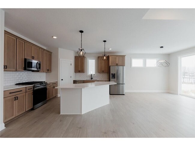 Building Photo - 13386 Fondant Trail N