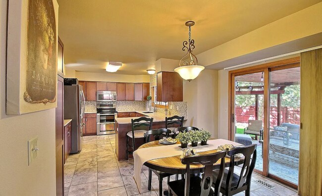 Building Photo - Spacious 4-Bedroom Home with Huge Fenced Y...