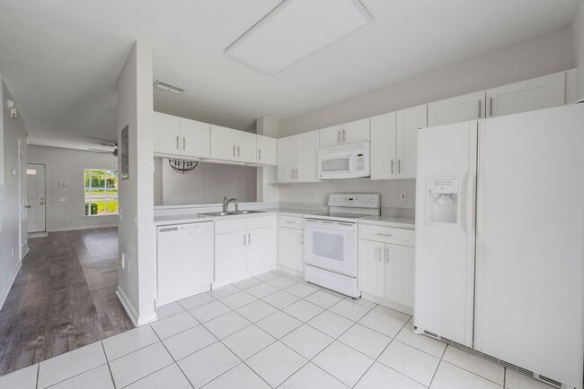 Building Photo - End Unit Water View