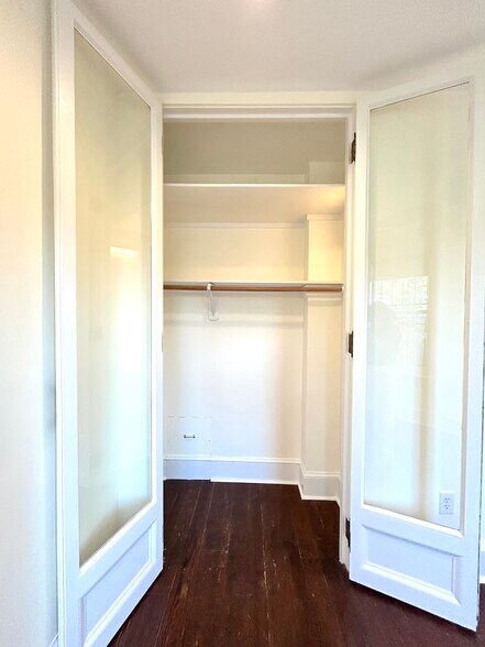 Bedroom 9'5." tall closet with top storage - 301 M St NW