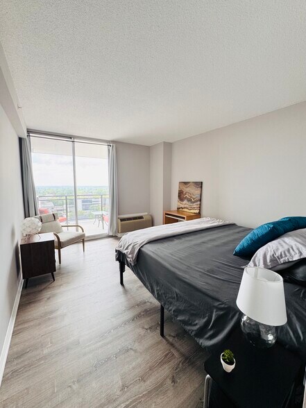 Large bedroom with balcony access. - 28 Allegheny Ave