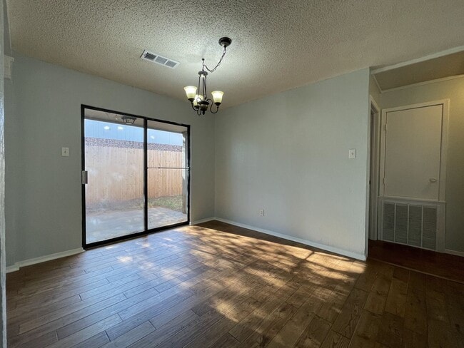 Building Photo - Spacious Snyder Home: 3 Beds, 2 Baths, 2-Car Garage & Cozy Carpeted Bedrooms!