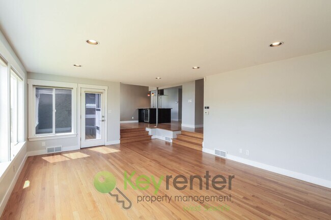 Building Photo - Waterfront Elegance with Private Dock and Designer Finishes