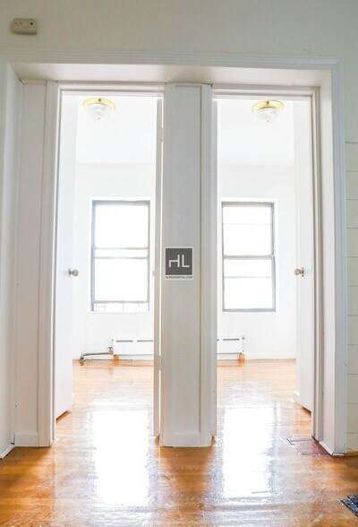 Building Photo - Modern 3BR in the Heart of the East Village – In-Unit W/D & Dishwasher!