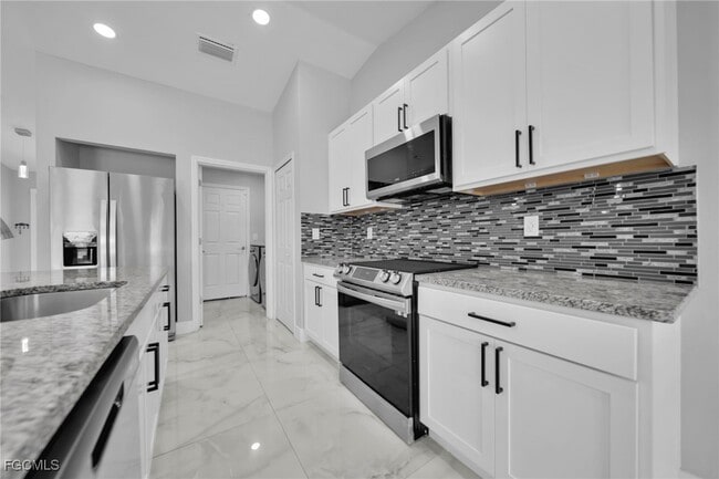 Building Photo - 3095 NW 4th Pl