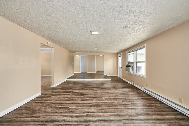 Building Photo - Coming Soon: 2 BR unit that includes water, trash, and yard care.