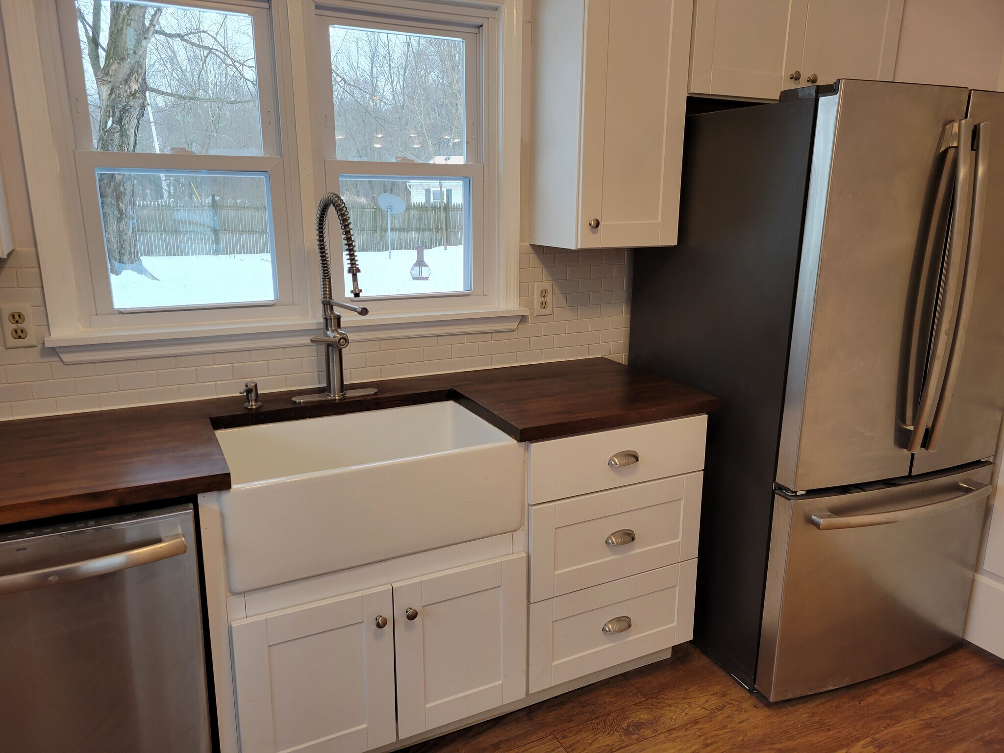 Kitchen has tub sink and wood counter - 20 Princeton St