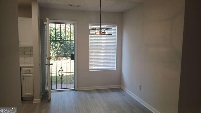 Building Photo - 5677 Wind Gate Ln
