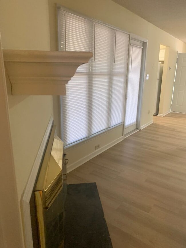 Building Photo - ONE LEVEL CONDO NEAR REX HOSPITAL -Firepla...