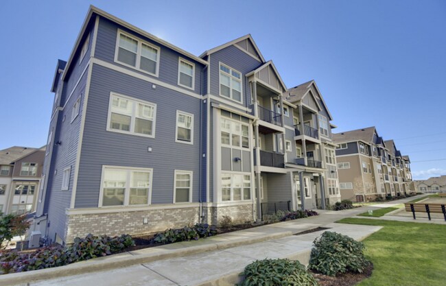 Primary Photo - Modern Ground-Level Condo in River Terrace...