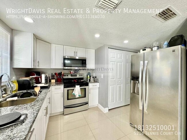 Building Photo - 5216 Tennis Ct Cir