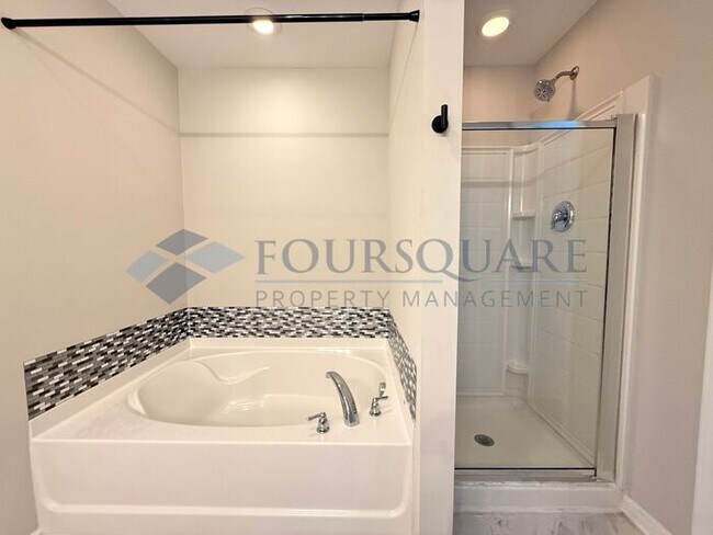 Building Photo - Lovely 3-Bedroom Townhome with Fireplace, Back Patio  & Community Amenities Included! Convenient ...