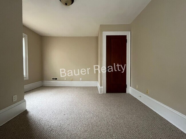 Building Photo - Three bedrooms, one and a half baths
