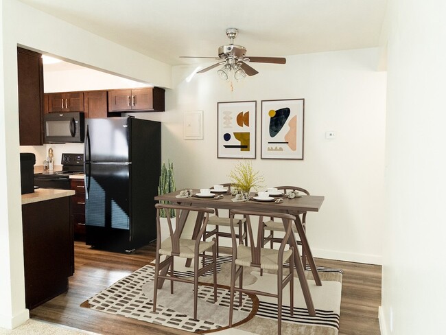 Open Concept Kitchen to Dining Area - Crossroads Apartments