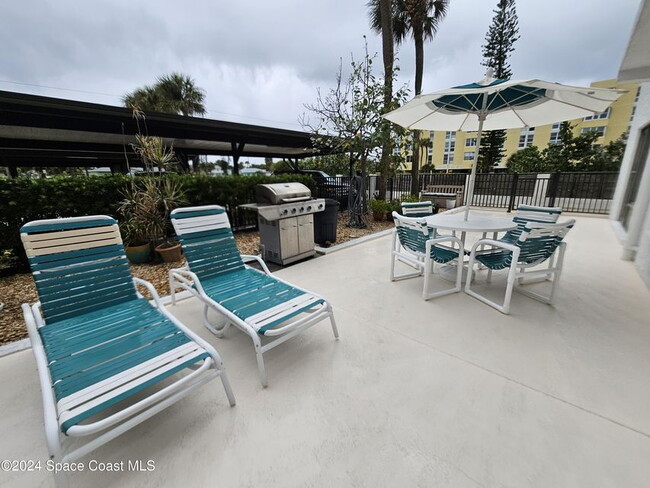 Building Photo - Coastal Paradise Awaits: Elegant 2-Bed, 2-...