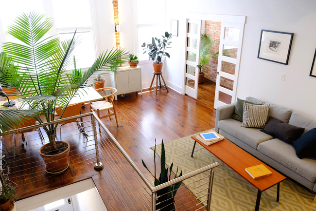 Beautiful light when you come up the stairs into the living area. - 18 W State St