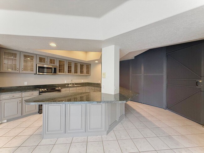 Building Photo - Garden Level in Luxury Home Available Now