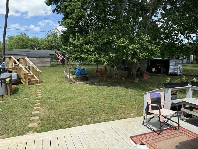 Building Photo - Fully Furnished Retreat with a Dream Backyard