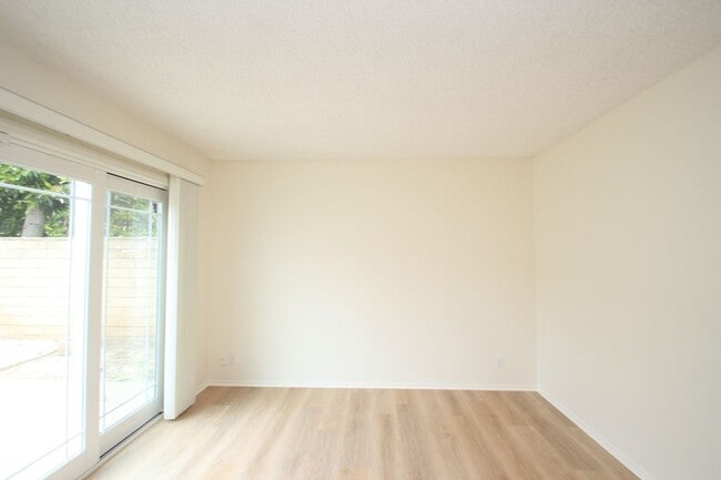 Building Photo - Welcome to this beautifully refreshed 4-bedroom, 2-bath two-story home located in desirable North...