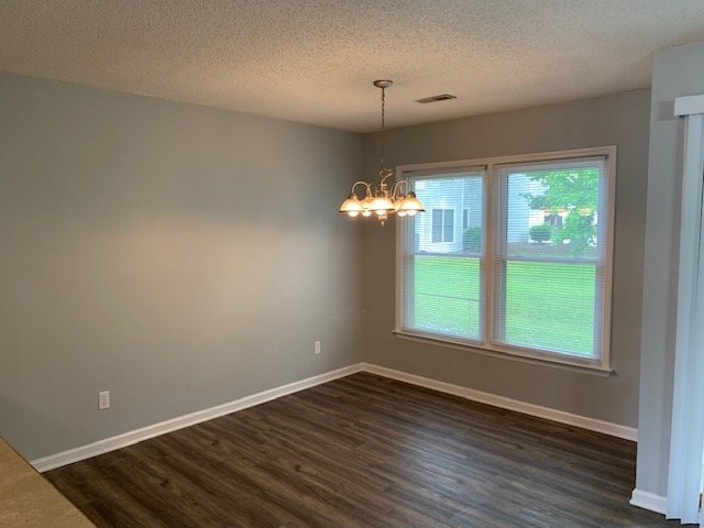 Building Photo - "Charming 2-Bed Condo Oasis with Fireplace...