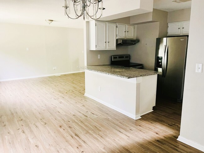Building Photo - Darling Home in Bel Aire - Finished Baseme...