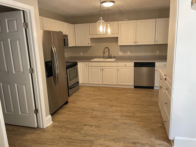 Building Photo - 4 Bed | 3 Bath Home with 1st-Floor Primary...