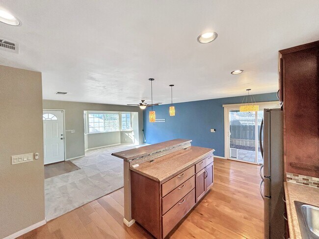 Building Photo - Beautiful 4BD/2BA W/ 2-Car Garage, AC, and...