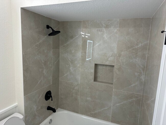 Building Photo - SEASONAL RENTAL - Downtown Sarasota Renovated Waterfront Condo