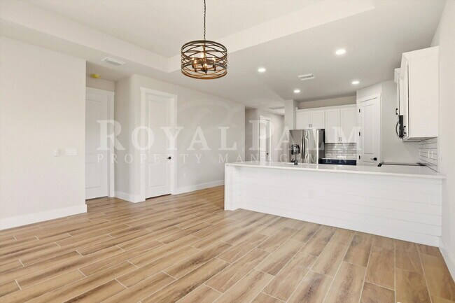 Building Photo - 3BR/2BA New Construction with Pool, Fence & Garage — Built Yesterday, Ready Today - Cape Coral