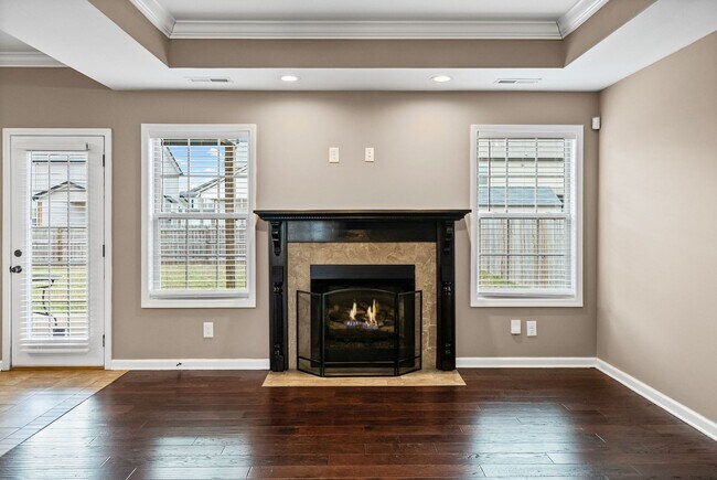 Building Photo - Four Bedroom with Three Car Garage!