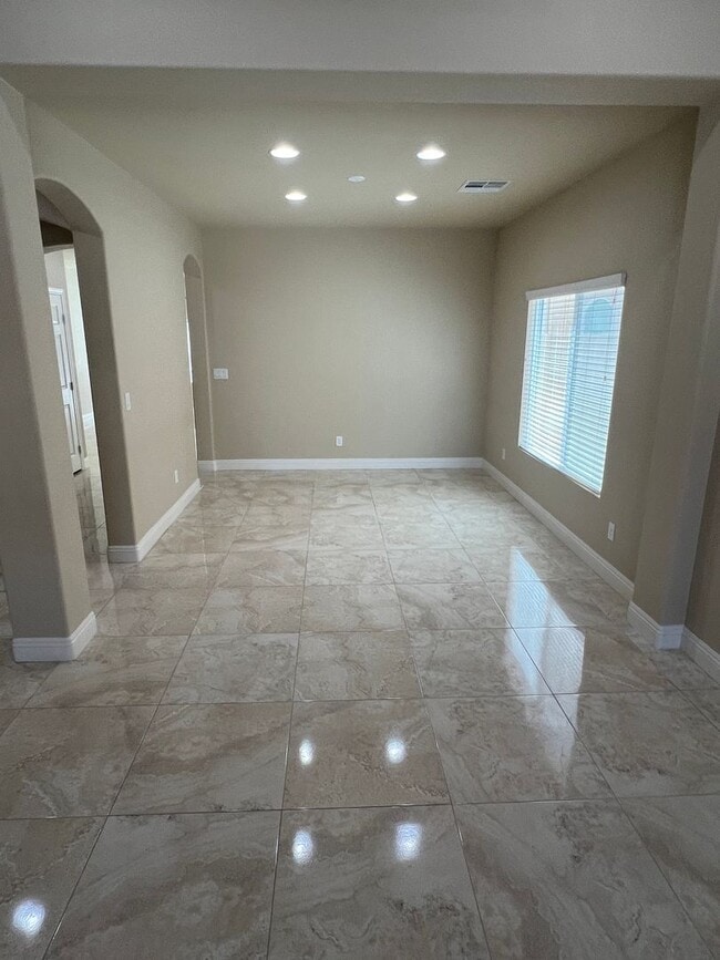 Building Photo - A Fantastic 4 Bedroom Home with the primary Downstairs, in Silverado Ranch