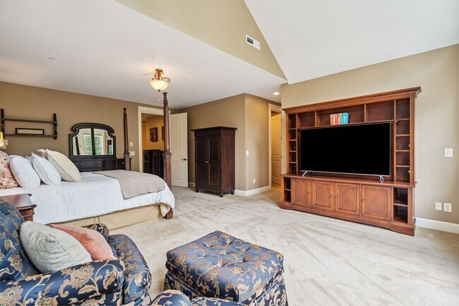 Building Photo - 2 Creeks Condominiums - Gated Community on...