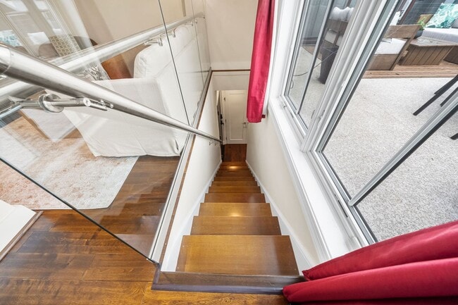 Building Photo - Stylish 2BR/2BA Bi-Level Condo with Private Roof Deck and Covered Parking!