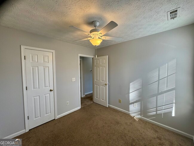 Building Photo - 5663 Windfall Ln