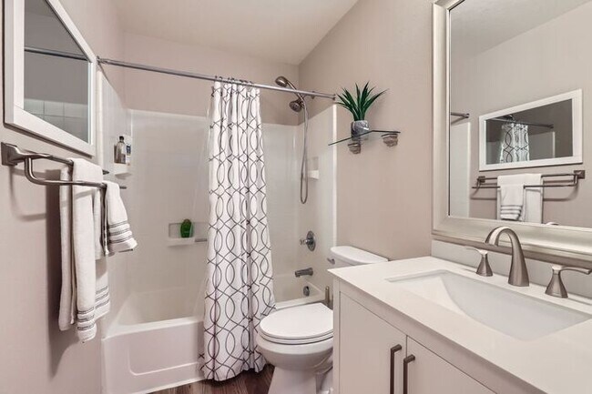 Building Photo - Updated 4-Bedroom with Serene Outdoor Spac...