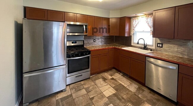 Building Photo - 6805 Jackson Ave