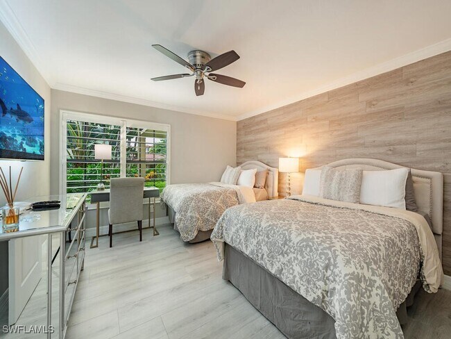 Building Photo - 6080 Pelican Bay Blvd