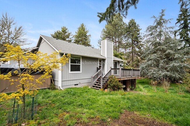 Building Photo - Move in by June 15 and get 2 weeks FREE! Charming Beaverton Home with Fireplace, Deck, and Attach...