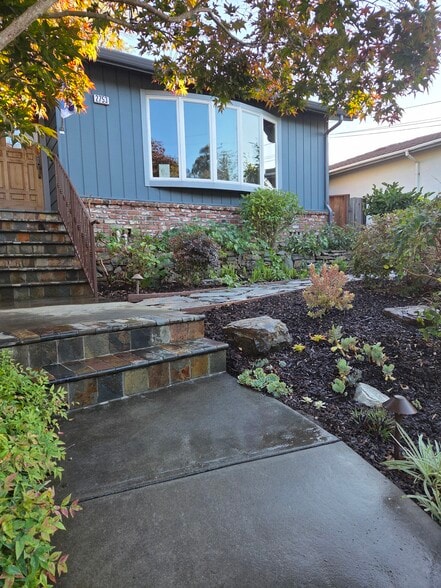 Half flight of stairs to reach path that goes around to in-law. - 2753 Sulphur Dr