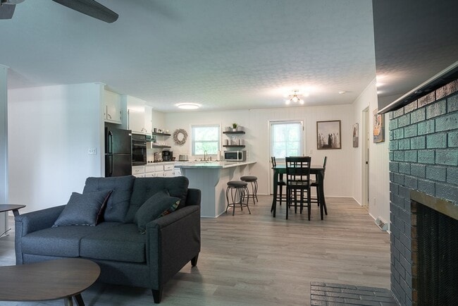 Building Photo - Classic brick rancher with carport and updated decor