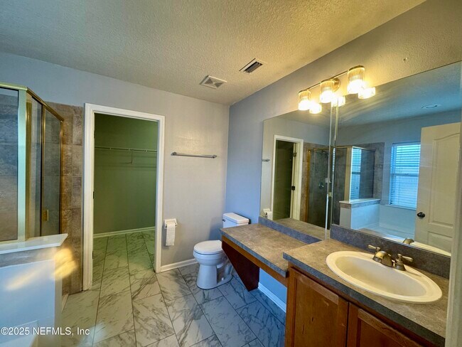 Building Photo - 11690 Brian Lakes Dr N