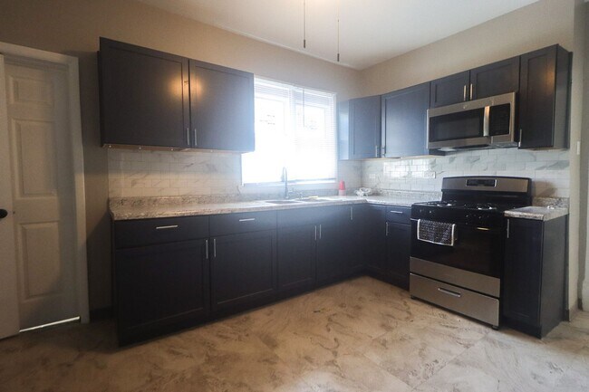 Primary Photo - Spacious & Newly Renovated 4-Bedroom Home